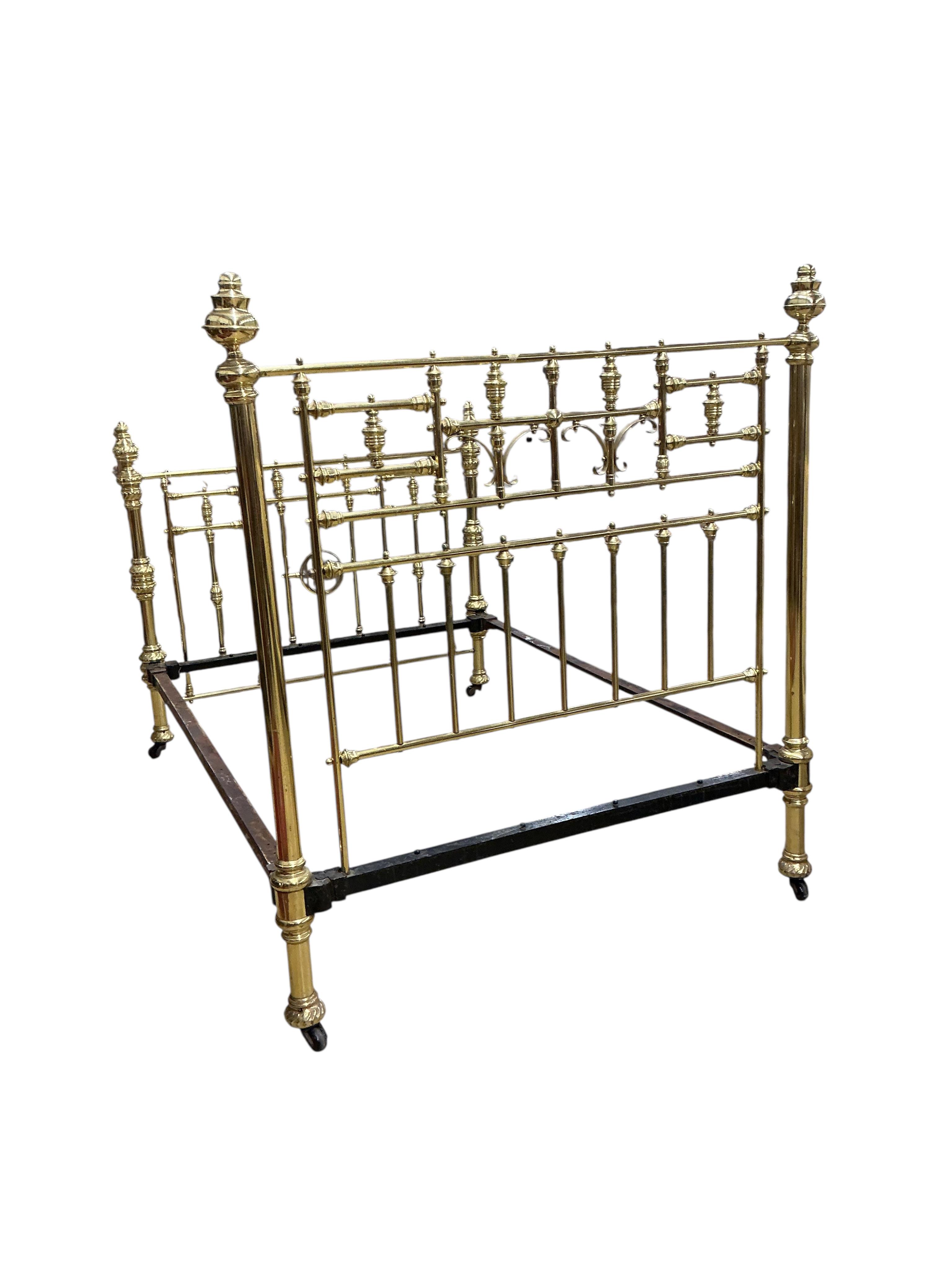 A Victorian brass bed frame, width 141cm, length 204cm, height 160cm